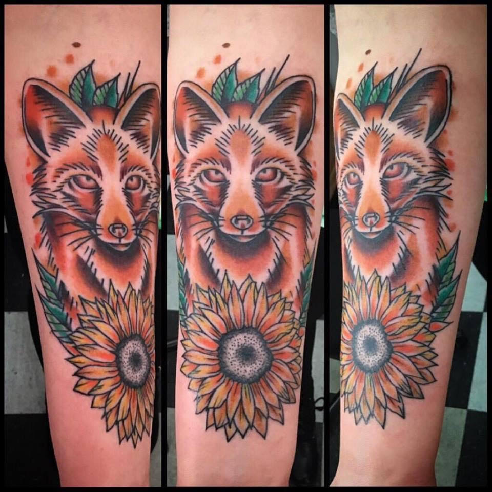 Beautiful fox and sunflower tattoo in color